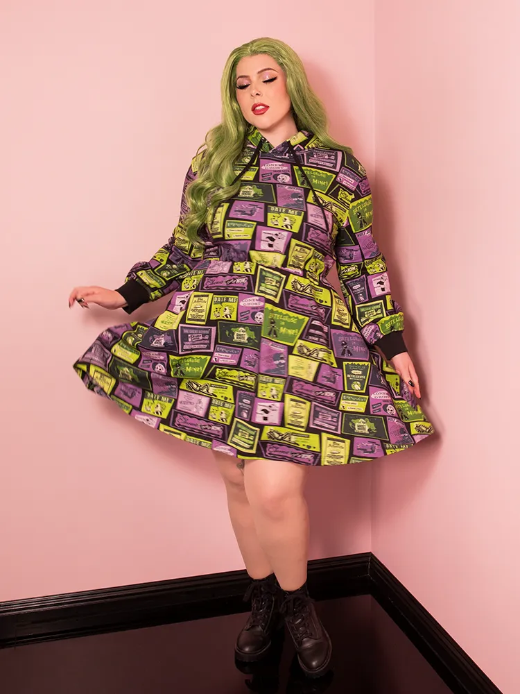 PRE-ORDER - Beetlejuice Beetlejuice™  Glow in the Dark Afterlife Advertisement Hoodie Dress